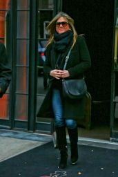 Jennifer Aniston in Coat - Leaving Her Hotel in New York City - November 2014