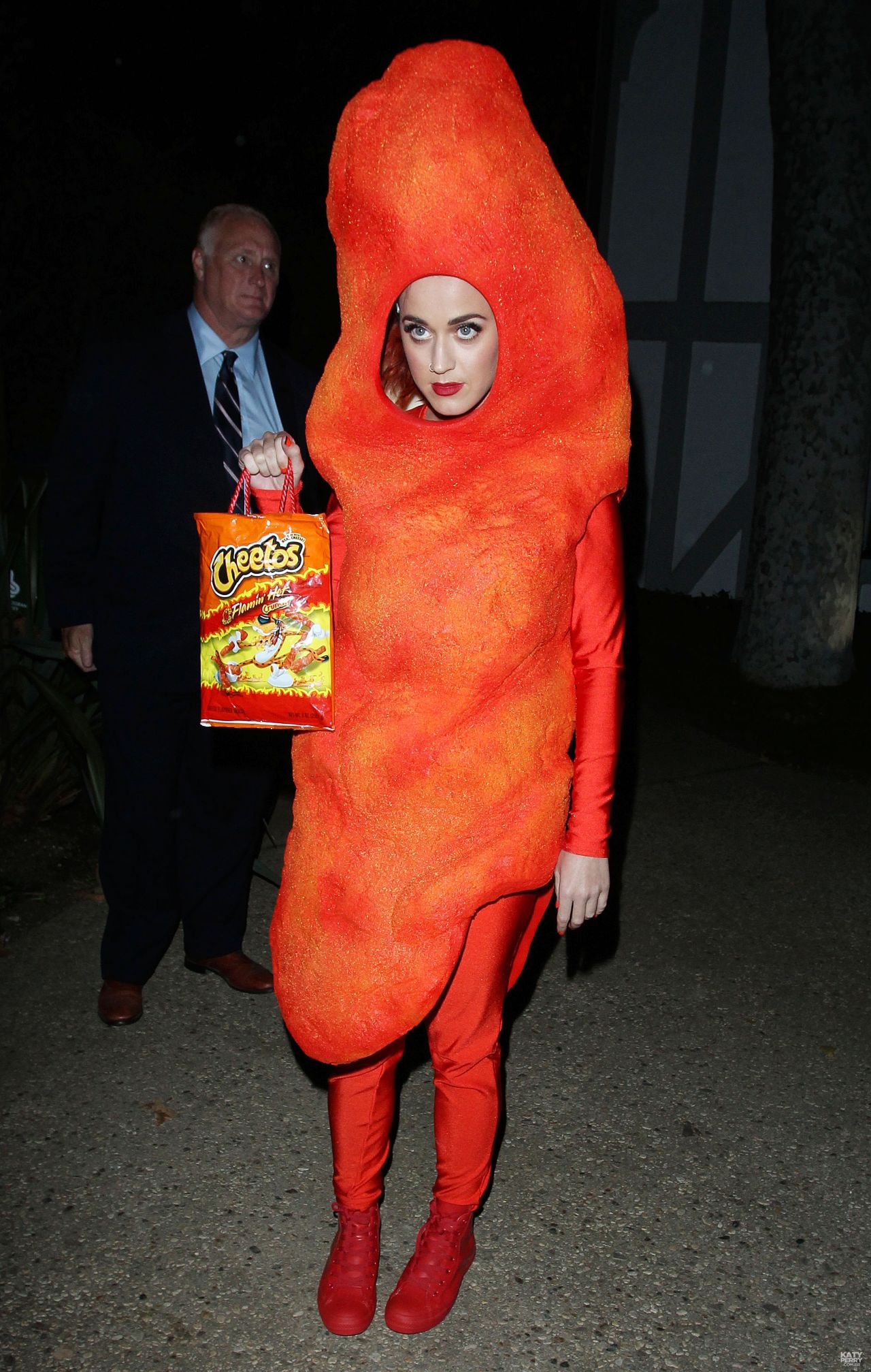 Katy Perry - Dressed As A Cheeto Arriving At Kate Hudson's Halloween ...