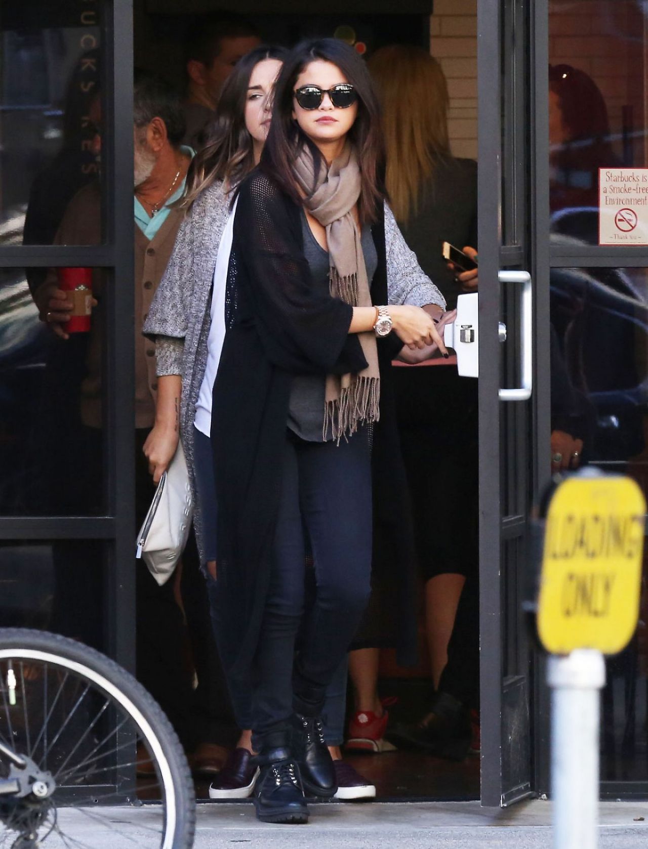 Selena Gomez at Starbucks in Studio City - Los Angeles, February 2014 •  CelebMafia