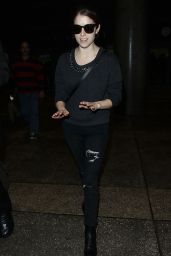 Anna Kendrick in Ripped Jeans - Arriving at LAX Airport in Los Angeles - December 2014