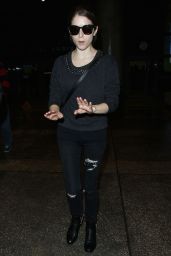 Anna Kendrick in Ripped Jeans - Arriving at LAX Airport in Los Angeles - December 2014