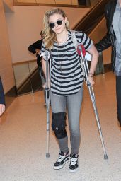 Chloe Moretz Wears Knee Brace & Uses Crutches - LAX Airport, December 2014