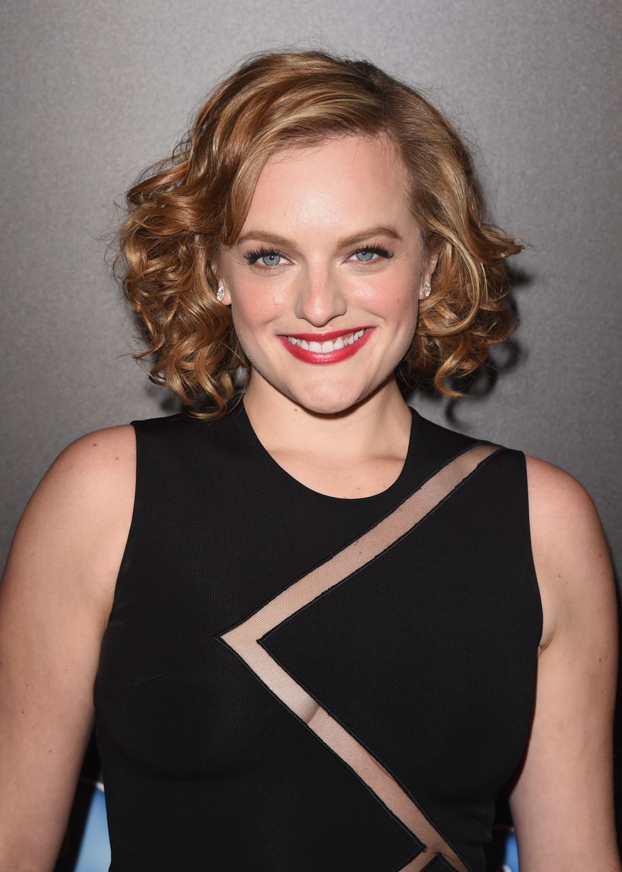 Elisabeth Moss 2014 PEOPLE Magazine Awards in Beverly Hills • CelebMafia