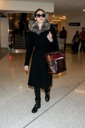 Emmy Rossum Winter Style - Arriving at LAX Airport in Los Angeles - December 2014