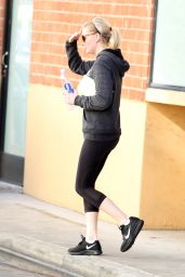 Kirsten Dunst in Leggings - Outside a Gym in Los Angeles, December 2014