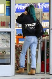 Kylie Jenner in Ripped Jeans - Out in the Rain in Los Angeles, December 2014