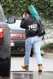 Kylie Jenner in Ripped Jeans - Out in the Rain in Los Angeles, December 2014