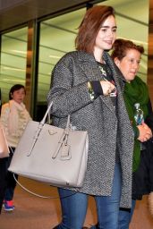 Lily Collins at Narita International Airport in Tokyo, December 2014