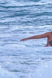 Margot Robbie in a Bikini at a Beach in Byron Bay, December 2014