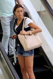 Melanie Sykes Leggy in Jeans Shorts - at Brisbane Airport, Dec. 2014