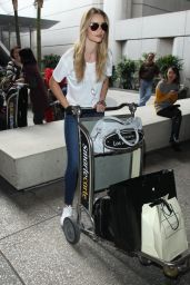 Rosie Huntington-Whiteley in Skiny Jeans at LAX Airport - December 2014