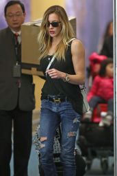 Katie Cassidy in Ripped Jeans at Vancouver International Airport, March 2015
