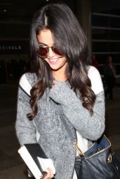Selena Gomez Casual Style - Arrives at LAX Airport in Los Angeles, March 2015