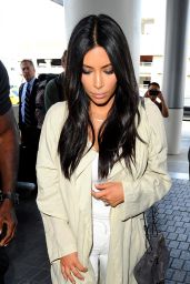 Kim Kardashian at LAX Airport in Los Angeles, April 2015 • CelebMafia