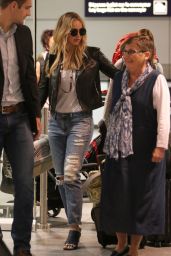 Jennifer Lawrence in Ripped Jeans at Trudeau International Airport in Montreal, May 2015