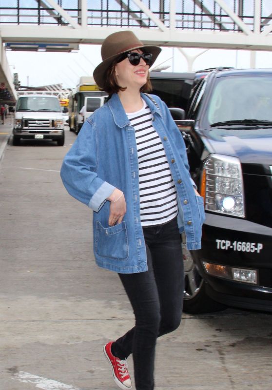 Dakota Johnson at LAX Airport, June 2015