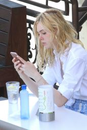 Elle Fanning - Chats on Her Phone After Enjoying Lunch in West Hollywood - July 2015