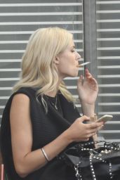 Lena Gercke Enjoys a Smoke - Berlin, August 2015