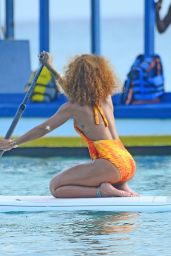 Rihanna Paddle Boating in a Swimsuit in Barbados, August 2015