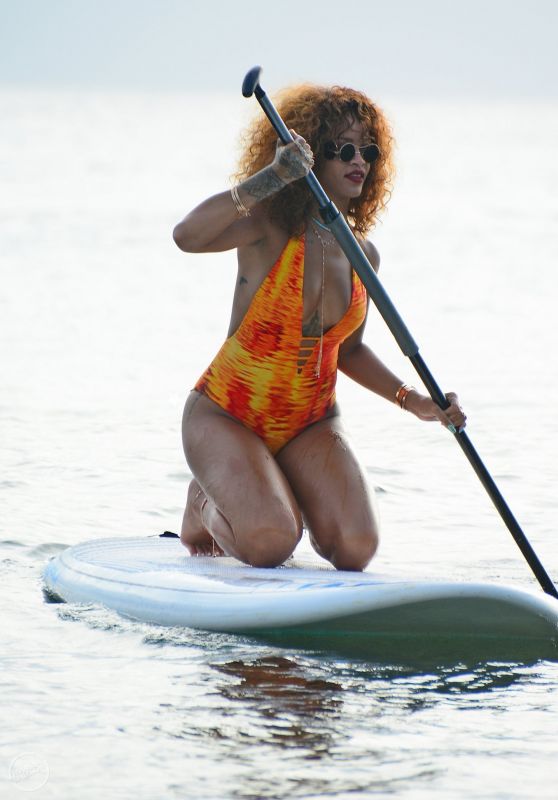 Rihanna Paddle Boating in a Swimsuit in Barbados, August 2015