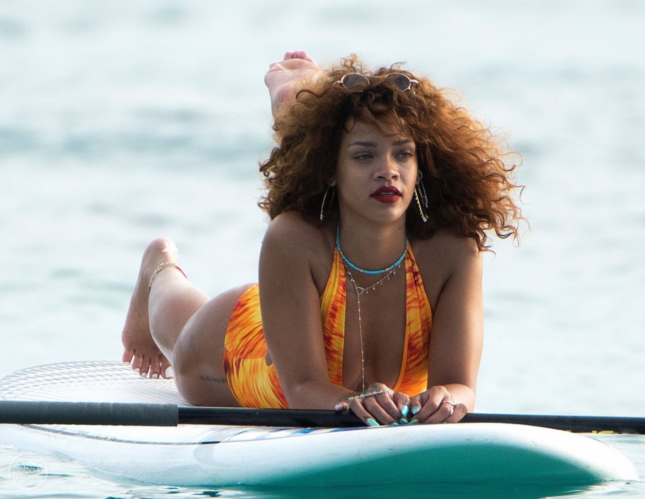 Rihanna Paddle Boating in a Swimsuit in Barbados, August 2015.