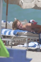 Toni Garrn in a White Bikini on the beach in Miami, September 2015