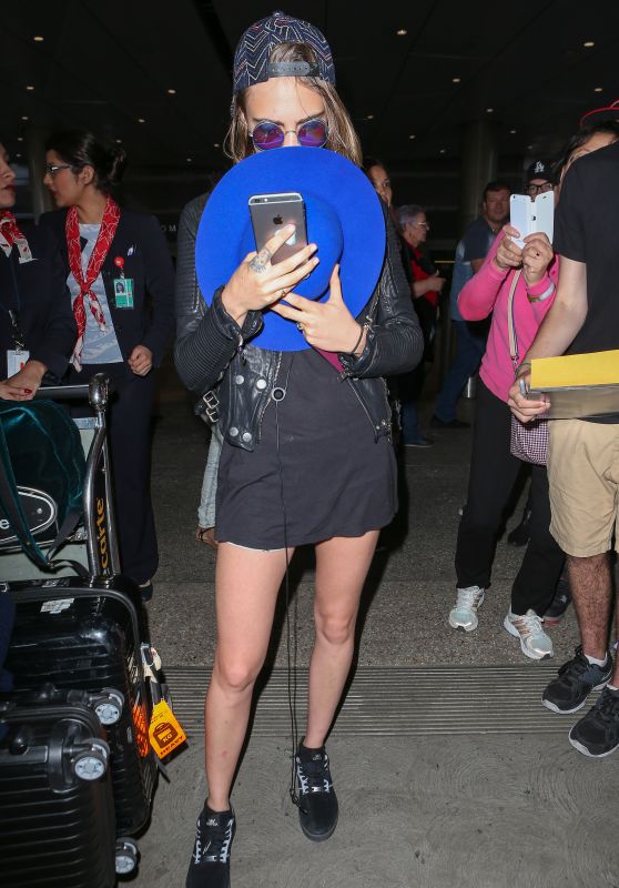 Cara Delevingne Shows Off Her Legs - LAX Airport, October 2015