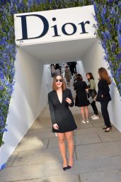 Emilia Clarke - Laving the Christian Dior Fashion Show at the Cour Carree du Louvre in Paris