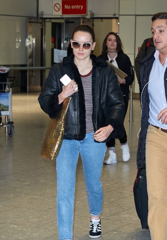 Daisy Ridley - Arriving at Heathrow Airport, London, November 2015