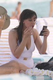 Daisy Lowe in aWhite Swimsuit on the Beach in Miami 12/30/2015 