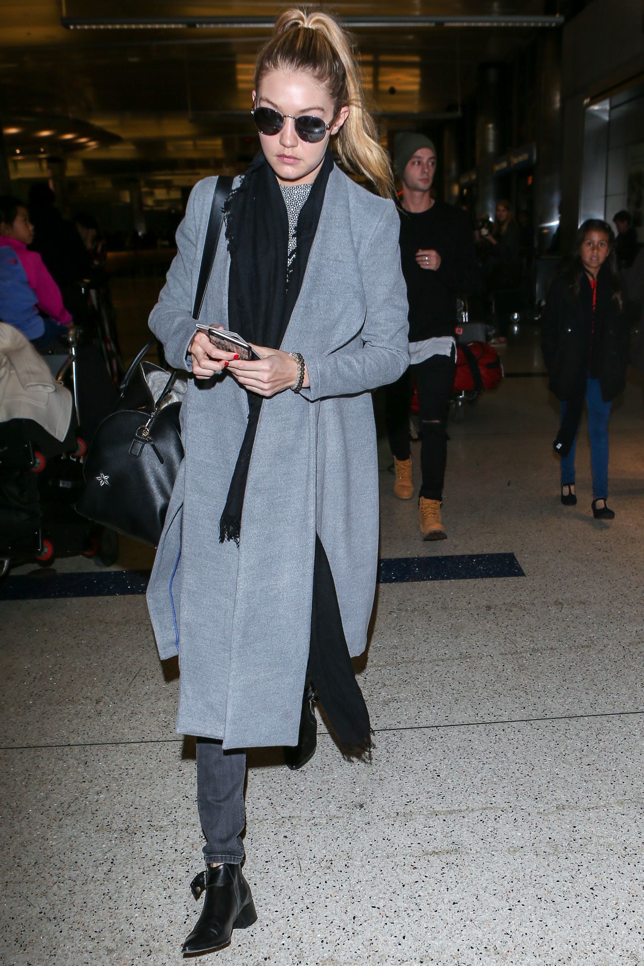 Gigi Hadid at LAX Airport, December 2015 • CelebMafia