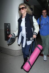 Kim Basinger in Her Varsity Jacket - Arrives at LAX in Los Angeles 12/21/2015
