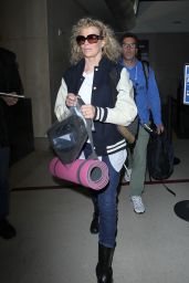 Kim Basinger in Her Varsity Jacket - Arrives at LAX in Los Angeles 12/21/2015