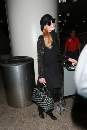 Paris Hilton - Returns to Los Angeles at LAX Airport - December 2015