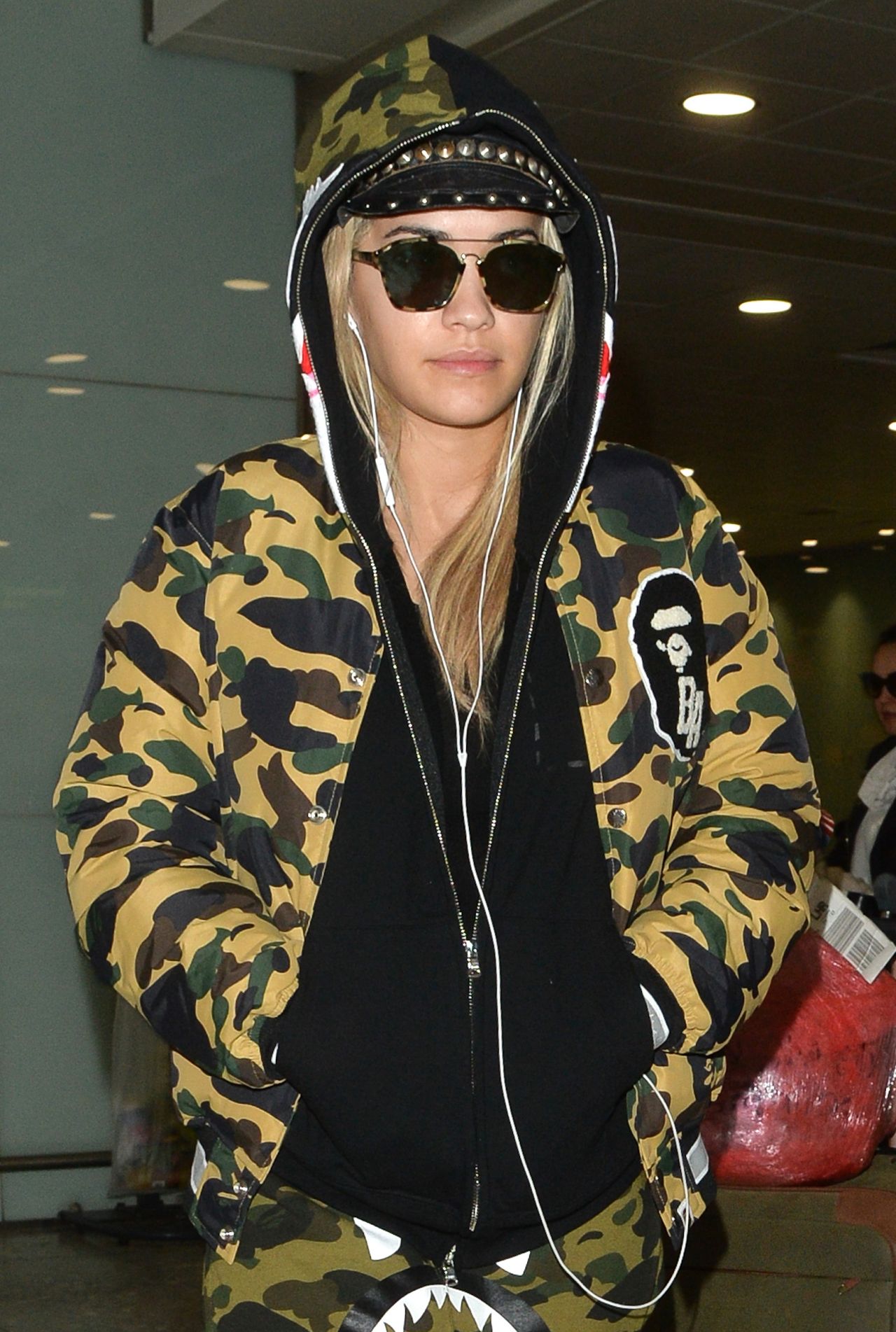 Rita Ora in Camouflage Tracksuit at Heathrow Airport in London 12/24 ...