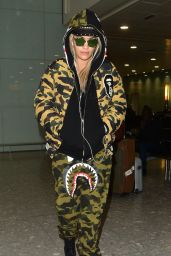 Rita Ora in Camouflage Tracksuit at Heathrow Airport in London 12/24/2015 
