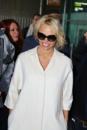 Pamela Anderson - Arriving at Roissy CDG Airport in Paris, January 2016
