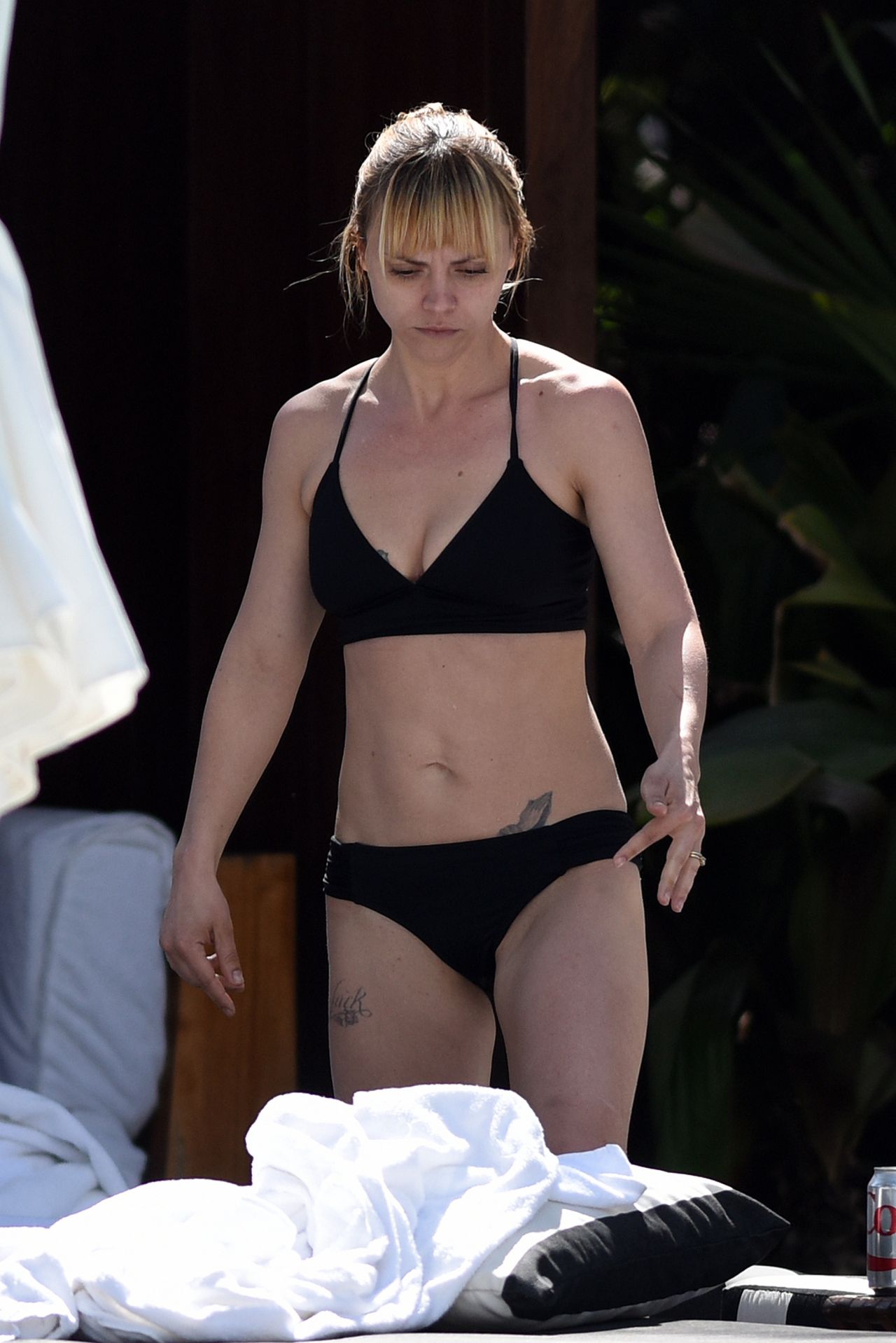 Christina Ricci in Black Bikini at a Pool in Miami, FL February 2016.