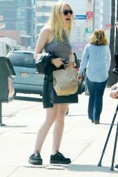 Dakota Fanning  Shows Off Her Legs in Mini Skirt - Out in Los Angeles, March 2016