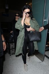Kim Kardashian and Kourtney Kardashian - Arrive Home From Iceland 4/20/2016