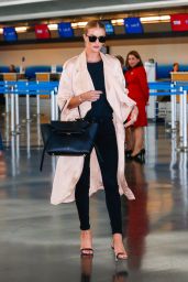 Rosie Huntington-Whiteley Glides Through JFK Airport in NYC 4/27/2016