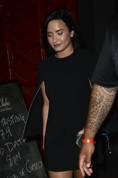Demi Lovato Looked Radiant in a Black Cape Dress and Black Gladiator Knee-High Boots in Hollywood 5/24/2016