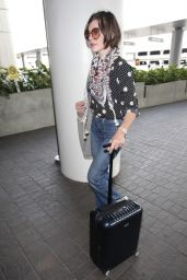 Milla Jovovich Travel Outfit - LAX Airport in Los Angeles 5/14/2016
