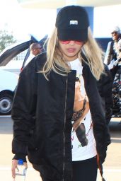 Rita Ora - Wore a Black Ball Cap With a Matching Jacket and Skinny Jeans - LAX in Los Angeles 5/29/2016