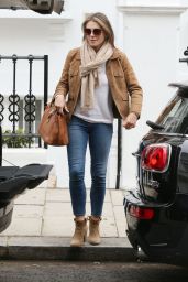 Elizabeth Hurley Travel Outfit - Arriving Home in London 6/1/2016