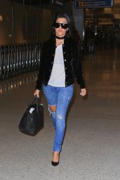 Kourtney Kardashian in Ripped Jeans - On Her Way to London 6/5/2016