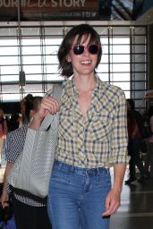 Milla Jovovich - Departs From the LAX Airport in Los Angeles 6/17/2016