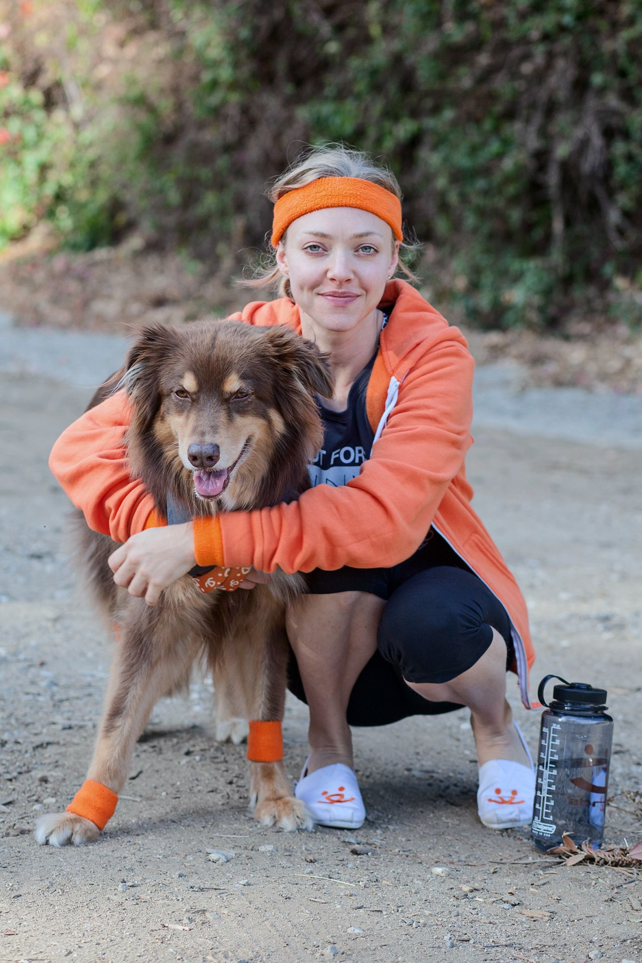 Amanda Seyfried - With her Australian Shepherd Dog Finn, as she