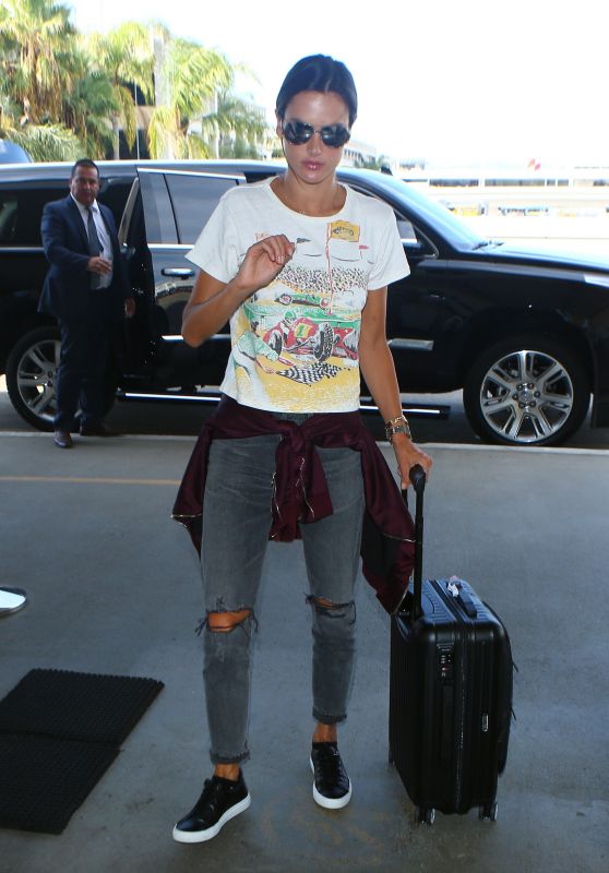 Alessandra Ambrosio in Ripped Jeans at LAX Airport in Los Angeles 09/26/ 2016