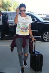 Alessandra Ambrosio in Ripped Jeans at LAX Airport in Los Angeles 09/26/ 2016